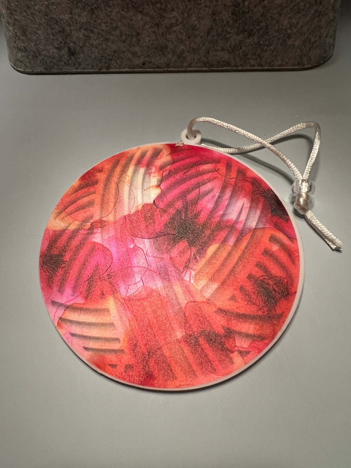 Acrylic White Yarn Ball Suncatcher Ornament with Red/Pink/Orange floral background
