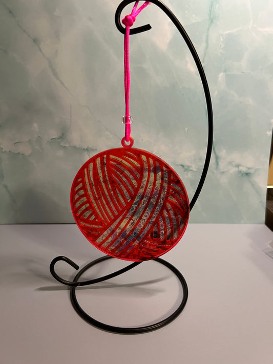 Acrylic Neon Pink Yarn Ball Suncatcher/Ornament with brown/gold background