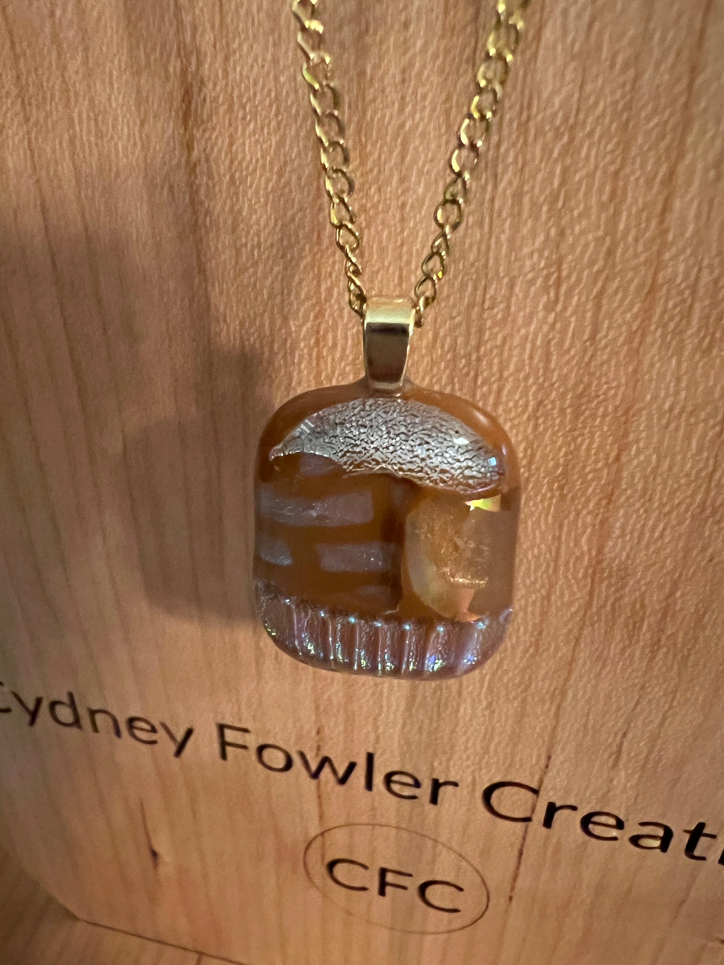 Fused Glass Pendant - light brown dichroic on gold tone chain